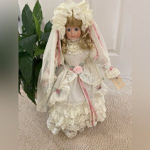 Vintage Seymour Mann  porcelain bride doll with music box